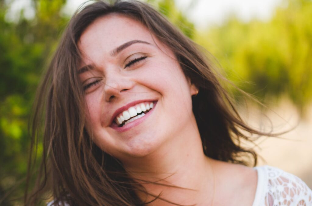 young female with the cuspid type of smile